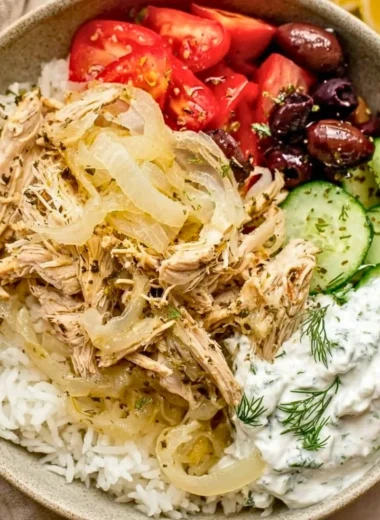 Slow cooker Greek chicken with herbs and vegetables ready to serve