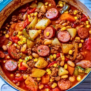 A bowl of Texas Cowboy Stew with ground beef, vegetables, and spices, served warm.