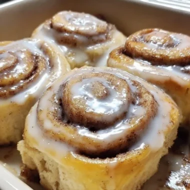 Delicious banana bread cinnamon rolls drizzled with icing