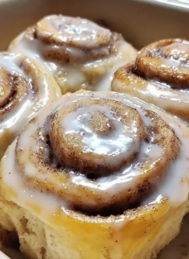 Delicious banana bread cinnamon rolls drizzled with icing