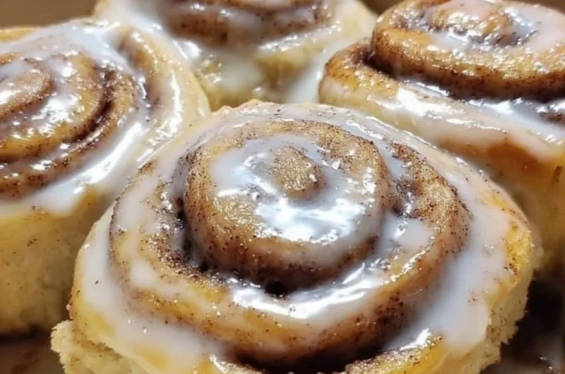 Delicious banana bread cinnamon rolls drizzled with icing