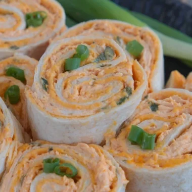 Buffalo Chicken Pinwheels with creamy filling and spicy sauce, perfect appetizer