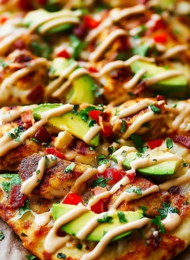 California Chicken Flatbread with Chipotle Ranch on a wooden serving board