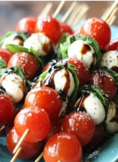 Colorful Caprese Salad Skewers featuring fresh mozzarella, tomatoes, and basil