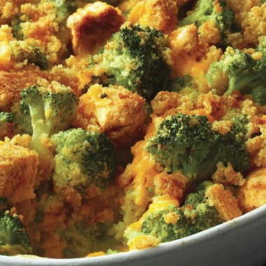 Delicious broccoli chicken casserole ready to be served with a golden topping.