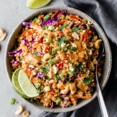 Crunchy Thai quinoa salad with creamy peanut ginger dressing served in a bowl