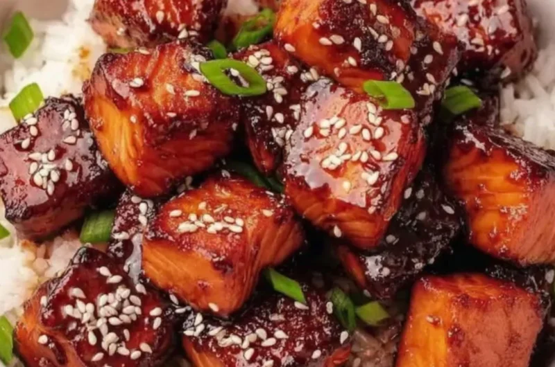 Honey garlic salmon bites bowl with fresh vegetables and rice