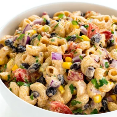 Colorful Mexican Pasta Salad with vegetables and dressing