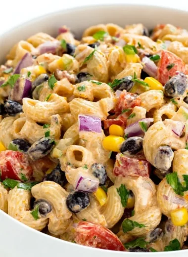 Colorful Mexican Pasta Salad with vegetables and dressing