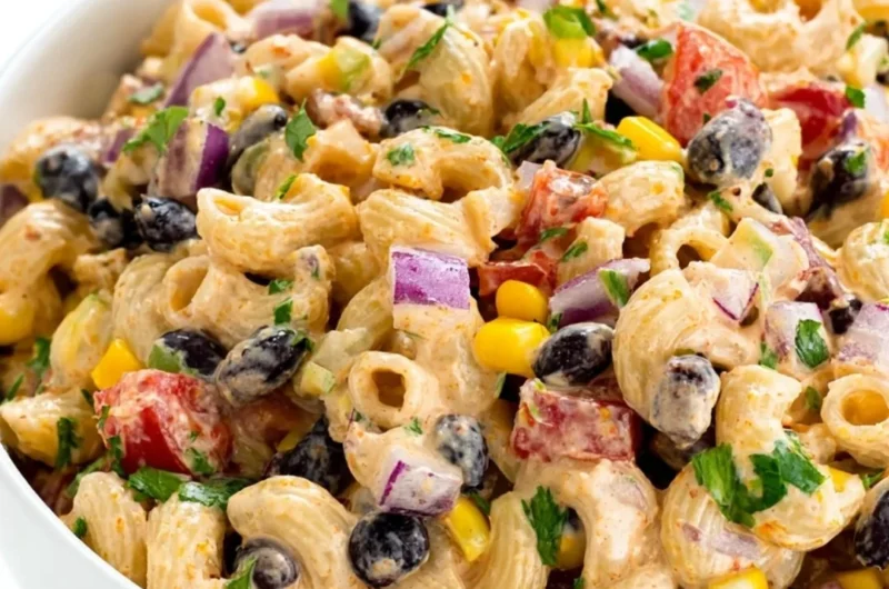 Colorful Mexican Pasta Salad with vegetables and dressing