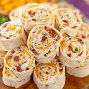 Delicious potluck pinwheels ready for a party or gathering.