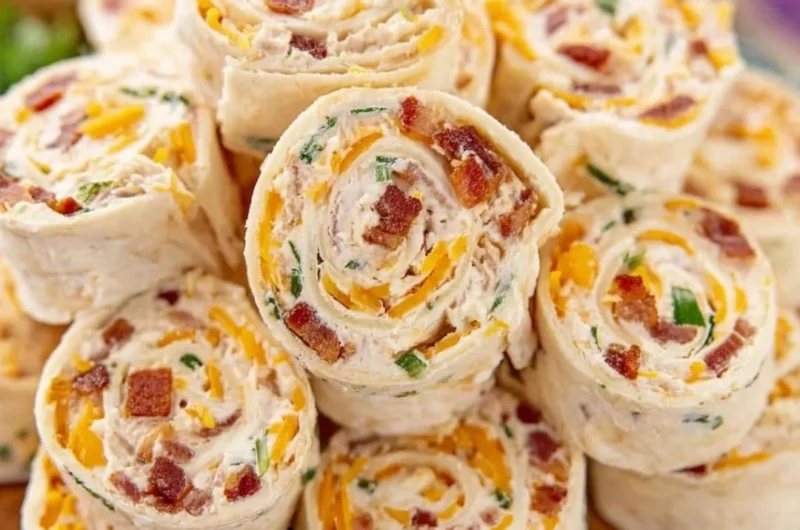 Delicious potluck pinwheels ready for a party or gathering.