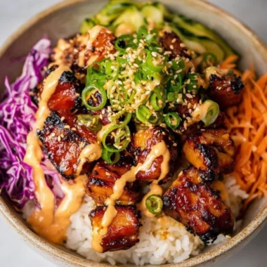 Bowl of Ultimate Crunchy Asian Salad with fresh vegetables and dressing