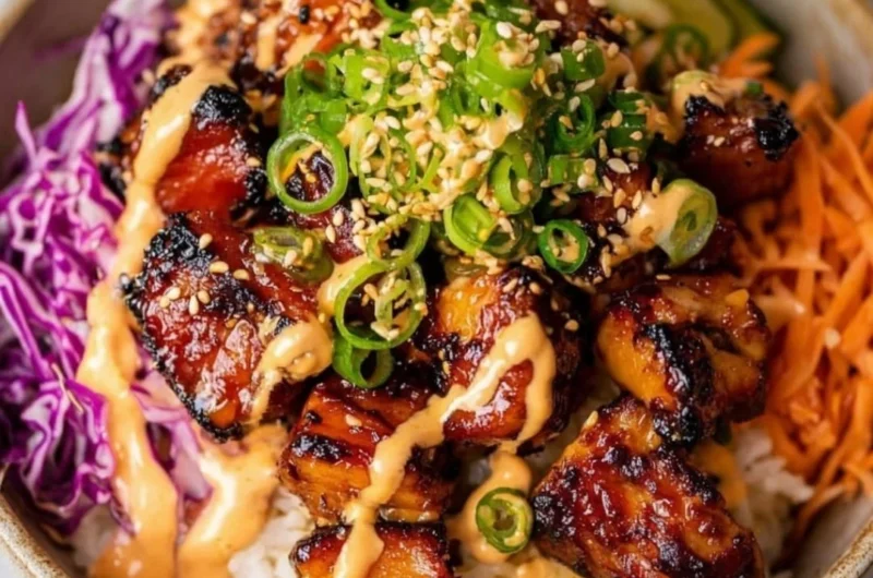 Bowl of Ultimate Crunchy Asian Salad with fresh vegetables and dressing