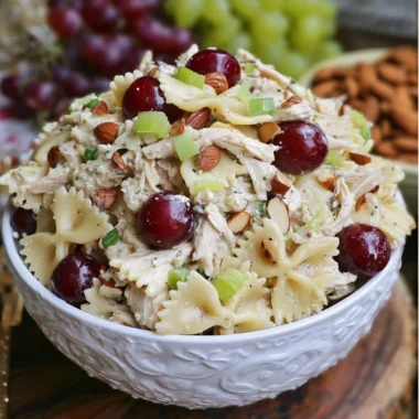 Waldorf Chicken Pasta Salad with apples, grapes, and walnuts in a creamy dressing.