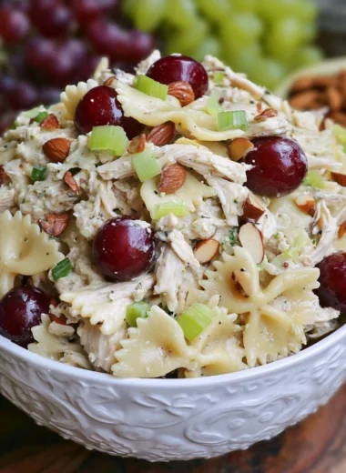 Waldorf Chicken Pasta Salad with apples, grapes, and walnuts in a creamy dressing.