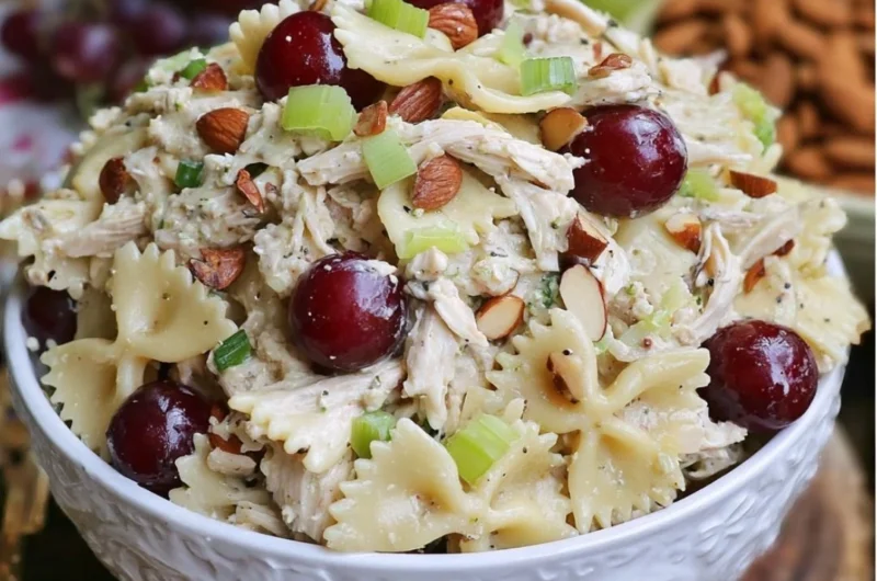 Waldorf Chicken Pasta Salad with apples, grapes, and walnuts in a creamy dressing.