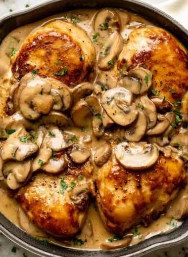 Delicious Chicken Marsala served with mushrooms in a rich wine sauce