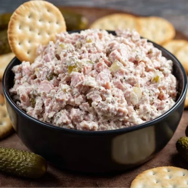 Delicious ham salad served in a bowl, perfect for sandwiches and snacks.