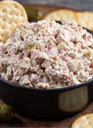 Delicious ham salad served in a bowl, perfect for sandwiches and snacks.