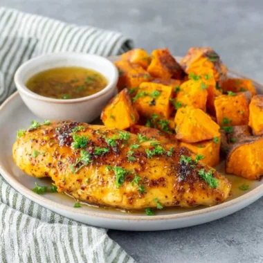 Delicious honey garlic chicken tenders served with fresh herbs