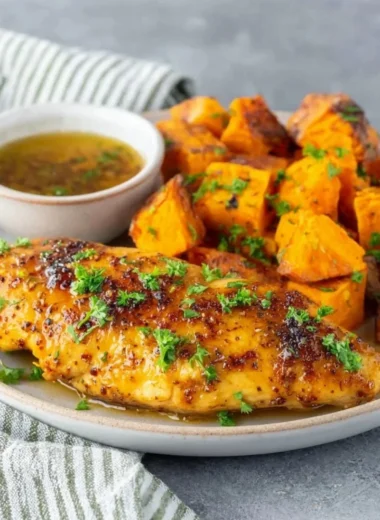Delicious honey garlic chicken tenders served with fresh herbs