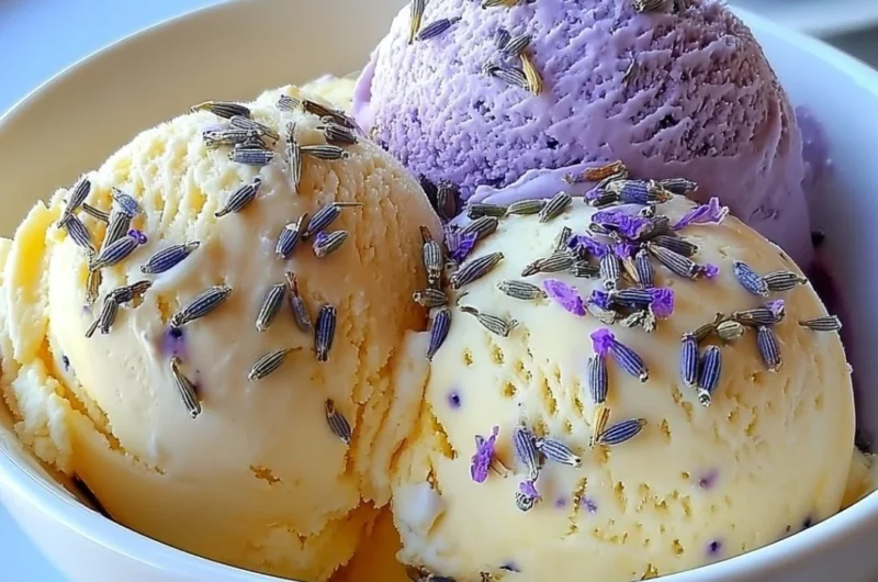 Creamy Lavender Honey Ice Cream with lavender sprigs and honey drizzle.
