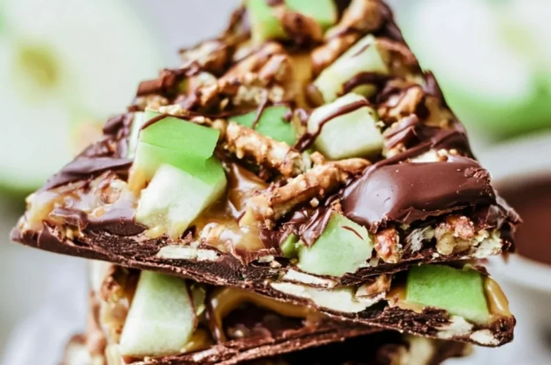 Delicious caramel apple bark pieces served on a cozy autumn-themed table.