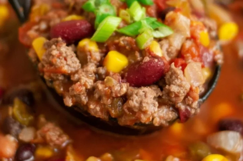 Bowl of delicious Cozy Santa Fe Taco Soup topped with fresh cilantro and cheese