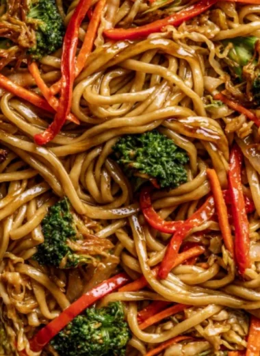 Delicious Cozy Veggie Lo Mein served in a bowl with colorful vegetables