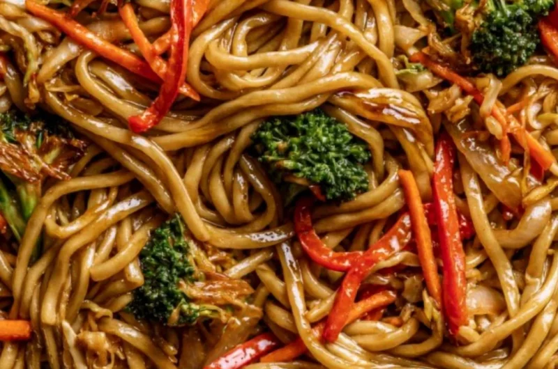 Delicious Cozy Veggie Lo Mein served in a bowl with colorful vegetables