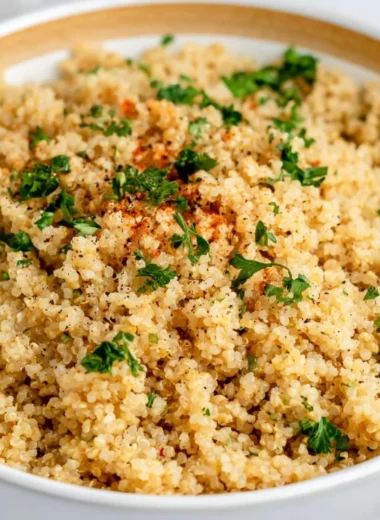 Delicious Garlic Butter Quinoa served in a bowl with herbs