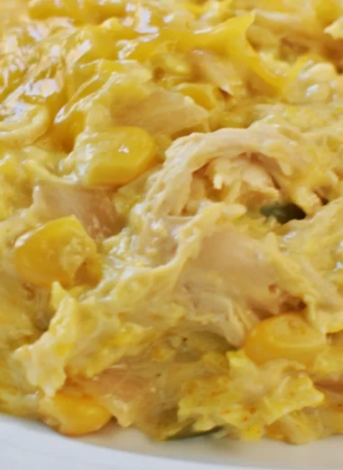 Delicious slow cooker cheesy chicken and rice dish ready to serve