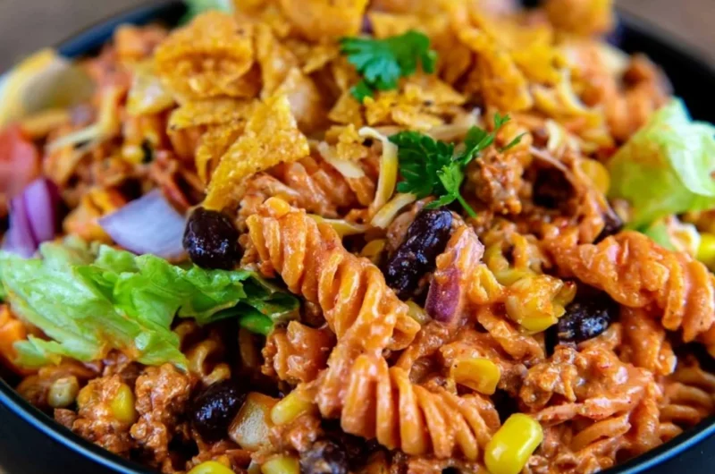Colorful and tasty Taco Pasta Salad served in a bowl with fresh ingredients