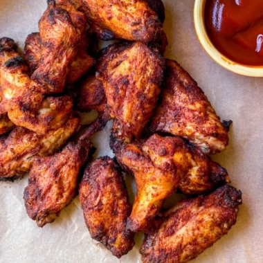 Delicious Traeger smoked chicken wings on a grill
