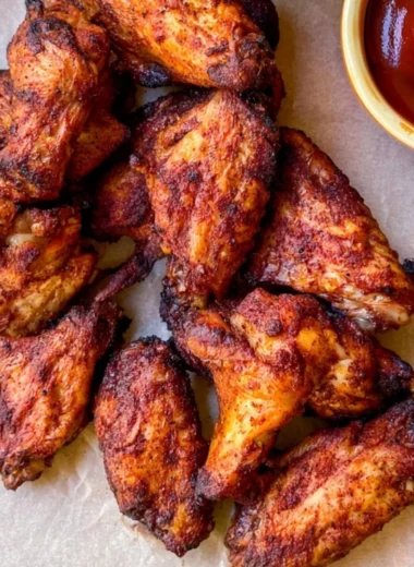Delicious Traeger smoked chicken wings on a grill