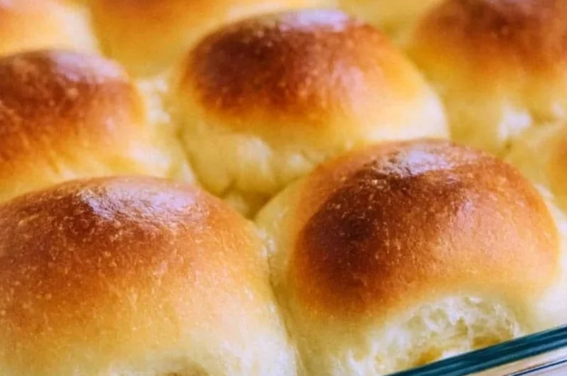 Freshly baked old-fashioned yeast rolls on a wooden table