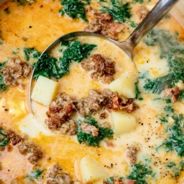 Delicious Zuppa Toscana soup served in a bowl, reminiscent of Olive Garden style.