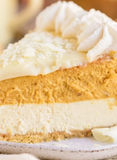 Cozy eggnog pumpkin cheesecake served on a festive table