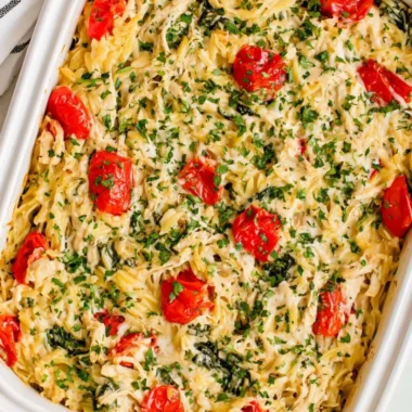 Delicious Chicken Orzo Bake ready to serve, featuring tender chicken and orzo pasta.