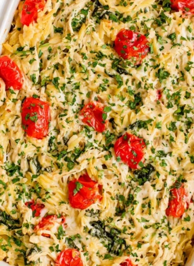 Delicious Chicken Orzo Bake ready to serve, featuring tender chicken and orzo pasta.