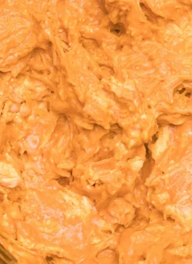 Crockpot Buffalo Chicken Dip served in a bowl with chips on the side